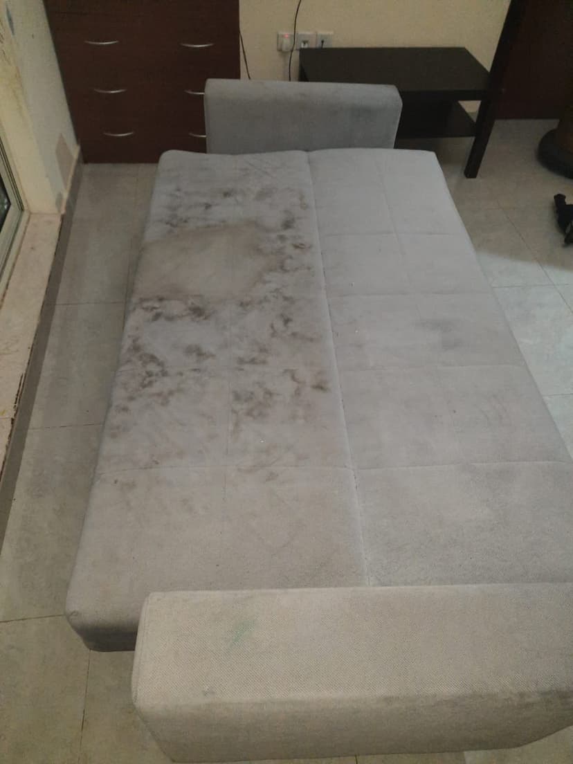 Sofa cleaning before - stained sofa cushions requiring professional deep cleaning in Dubai - Job 2